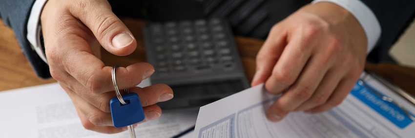 Man handling rental property paperwork